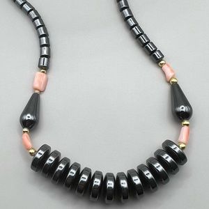 Hematite Stone and Salmon Coral Disc and Bead Necklace 19”